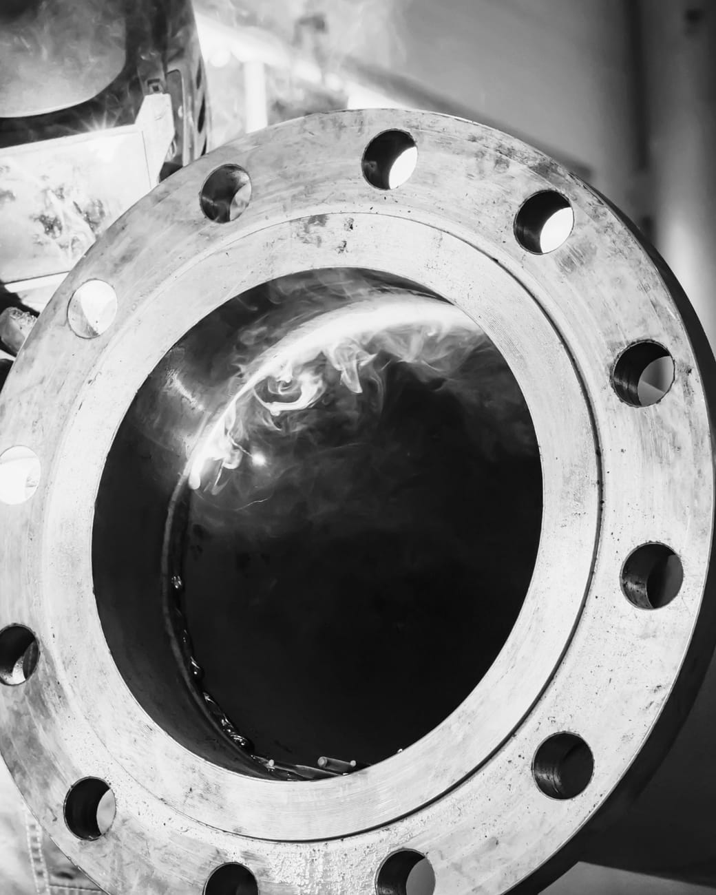 ESP Projects welder fabricating a flanged pipe spool in the workshop